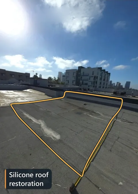 Flat roof area outlined and labeled silicone roof restoration